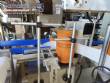 Automatic labeling machine for flat cylindrical bottles and jars Maqmundi