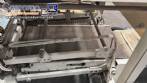 Automatic L-sealer with shrink tunnel.