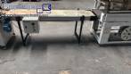 Automatic L-sealer with shrink tunnel.