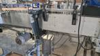Automatic double head labeling machine for flat bottles Bauch Campos