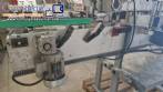 Automatic double head labeling machine for flat bottles Bauch Campos
