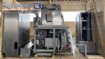Tetra Pak A3 aseptic filling machine with cardboard packer 70 and tray shrink 51.