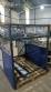 Pick and place product feeder for flowpack transfer cartoning machine
