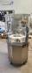 Complete filling line with Tecman Nelpas Tecnoenvase Tudela bottle filling, labeling, capping, and positioning machines for cosmetic liquids.