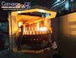 Sidel PET bottle blow molding machine, 6,000 bottles per hour.