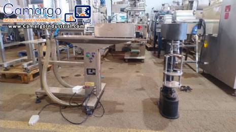 Filling machine with 2 nozzles for liquids and pilfer cap screwer