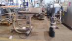 Filling machine with 2 nozzles for liquids and pilfer cap screwer
