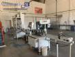 Linear filling machine with stainless steel threading machine 12 Narita nozzles