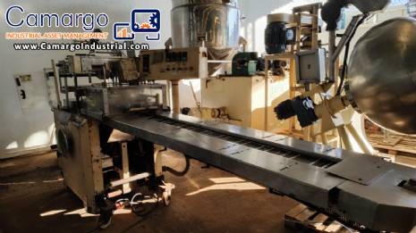 Otto Haensel V3 automatic cellophane wrapping machine for packaging boxes of teas, chocolates, perfumes, biscuits, creams, candies, sweets.