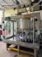Packaging line with IMSB bung capper, Maqmundi labeler and accumulator table