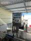 Packaging line with IMSB bung capper, Maqmundi labeler and accumulator table
