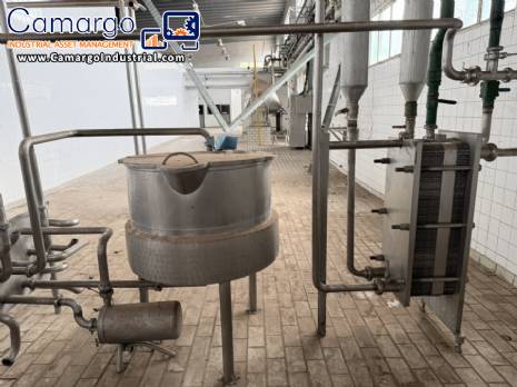 Stainless steel jacketed tank.  With heat exchanger and centrifugal pump.