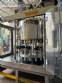 Stainless steel rotary filling machine with 16 IMSB nozzles for bottles and jars