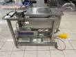 Unifiller stainless steel dosing pump with homogenizing mixer for bakery foods.