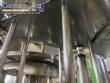 Gravimetric rotary filling machine in stainless steel with cabin