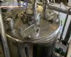Gravimetric rotary filling machine in stainless steel with cabin