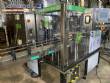 Gravimetric rotary filling machine in stainless steel with cabin