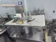Automatic rotary dosing filling machine with sealer for Delgo cups, 3500 cups per hour.