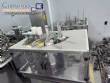 Automatic rotary dosing filling machine with sealer for Delgo cups, 3500 cups per hour.