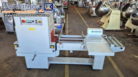 L-shaped packaging sealer with semi-automatic shrink tunnel.