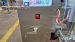 Dosing and packaging machine for granular and powdered products
