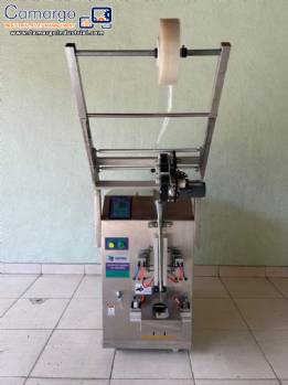 Cetro automatic sachet filling and packaging machine with dosing unit.