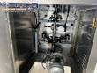 Automatic volumetric dosing packaging machine for powder products.