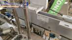 Automatic double-head labeling machine for cylindrical and flat bottles, Tudela, 3,000 labels per hour.
