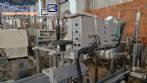 Automatic double-head labeling machine for cylindrical and flat bottles, Tudela, 3,000 labels per hour.