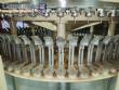 Automatic rotary filling machine for carbonated soft drinks with 72 nozzles