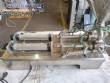 Stainless steel benchtop filling machine for liquids and viscous products