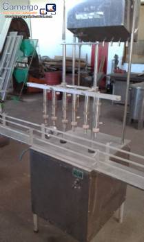 Linear filling machine with 6 stainless steel spouts Nocelli