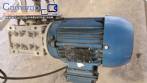 Inclined screw conveyor with stainless steel silo