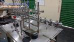 Linear filling machine with 6 pistons filling system