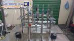 Linear filling machine with 6 pistons filling system