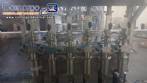 Linear filling machine with 6 pistons filling system