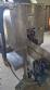Labeling machine with steam sleeve tunnel and bottle baler