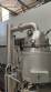 Distiller extractor concentrator with heating jacket and condensation system
