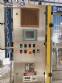 Zegla rotary filling machine with rinser and three-block capping system.