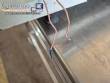 Vibrating trough for multi-head scale