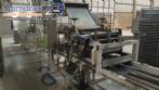 Continuous line laminator, cutter and folder for long dry pasta (tagliatelle).