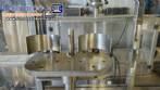 Stainless steel filling machine for beer liquids in Brabeer bottles