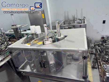 Automatic rotary dosing filling machine with sealer for Delgo cups, 3500 cups per hour. Automatic rotary dosing filling machine with sealer for Delgo cups, 3500 cups per hour.