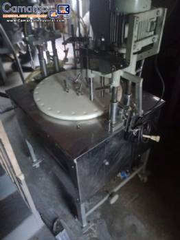Erli rotary liquid filling machine with 4 pistons, 14,400 units per hour. Erli rotary liquid filling machine with 4 pistons, 14,400 units per hour.